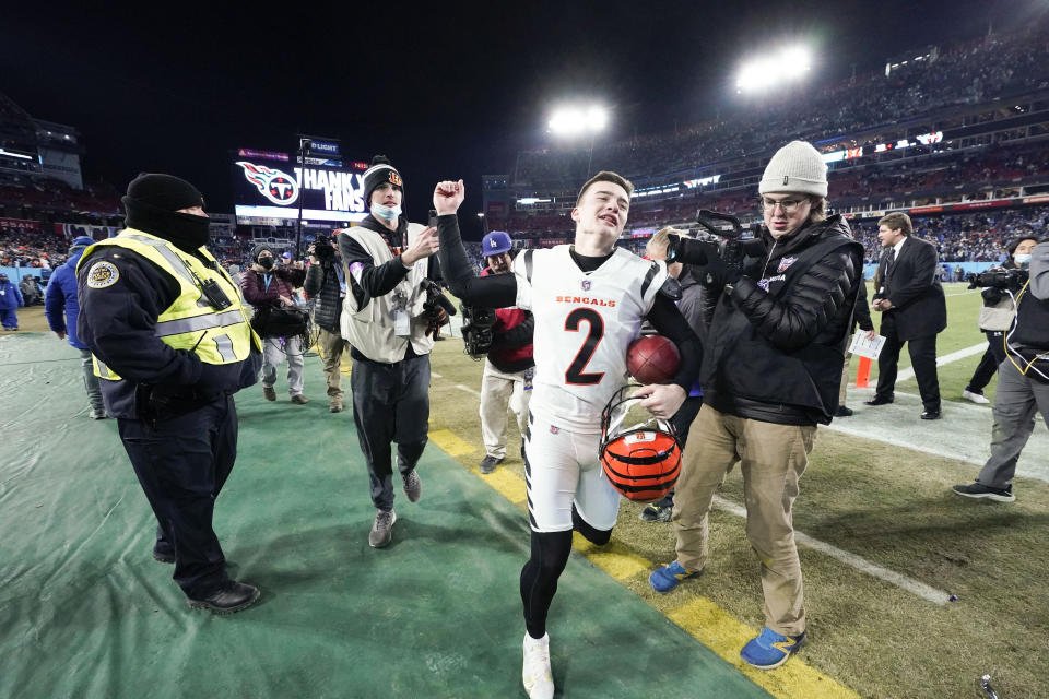 Cincinnati Bengals kicker Evan McPherson (2) leaves the field after an NFL divisional round playoff football game against the Tennessee Titans, Saturday, Jan. 22, 2022, in Nashville, Tenn. The Cincinnati Bengals won 19-16. (AP Photo/Mark Humphrey)