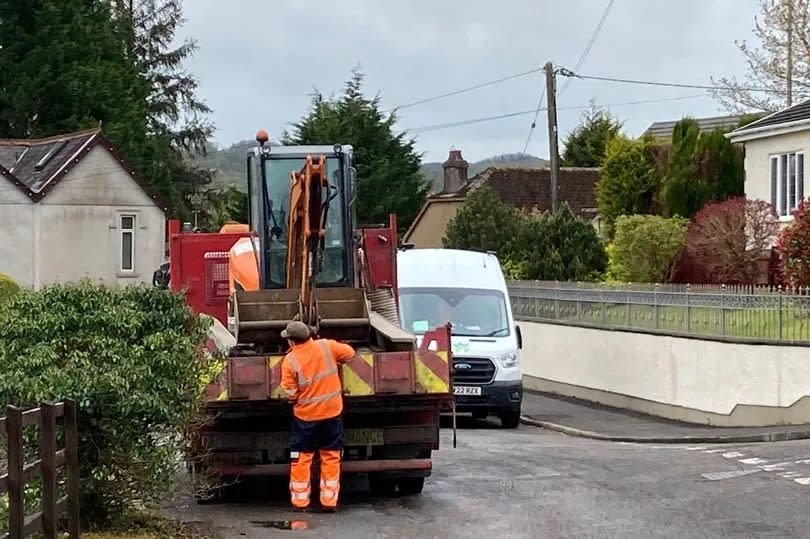 Contractors at the scene of a burst sewer on the outskirts of Porthyrhyd on April 29 -Credit:Copyright Unknown