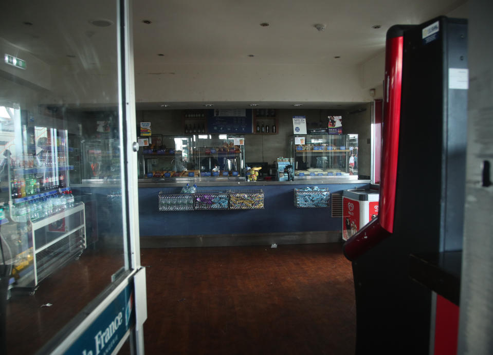 An empty shop in darkness at Clapham Junction station in London during a power cut, which has caused �apocalyptic� rush-hour scenes across England and Wales, with traffic lights down and trains coming to a standstill.