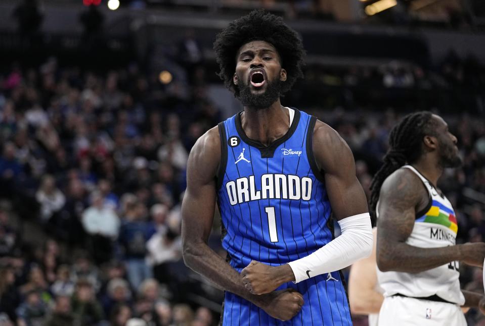 Orlando Magic forward Jonathan Isaac (1) celebrates after making a basket during the second half of an NBA basketball game against the Minnesota Timberwolves, Friday, Feb. 3, 2023, in Minneapolis. (AP Photo/Abbie Parr)