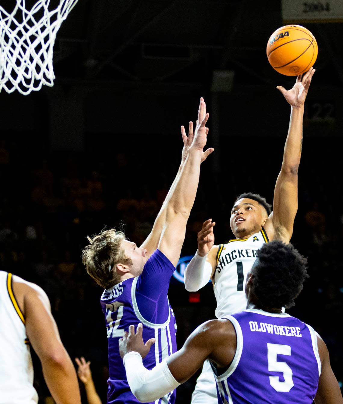 Wichita State’s Xavier Bell shoots over Central Arkansas’ Churchill Bounds during the first half of their season-opening game on Monday night.