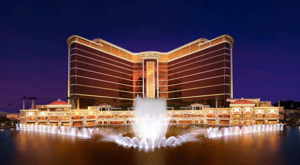 Wynn Palace in Macau lit up at night.