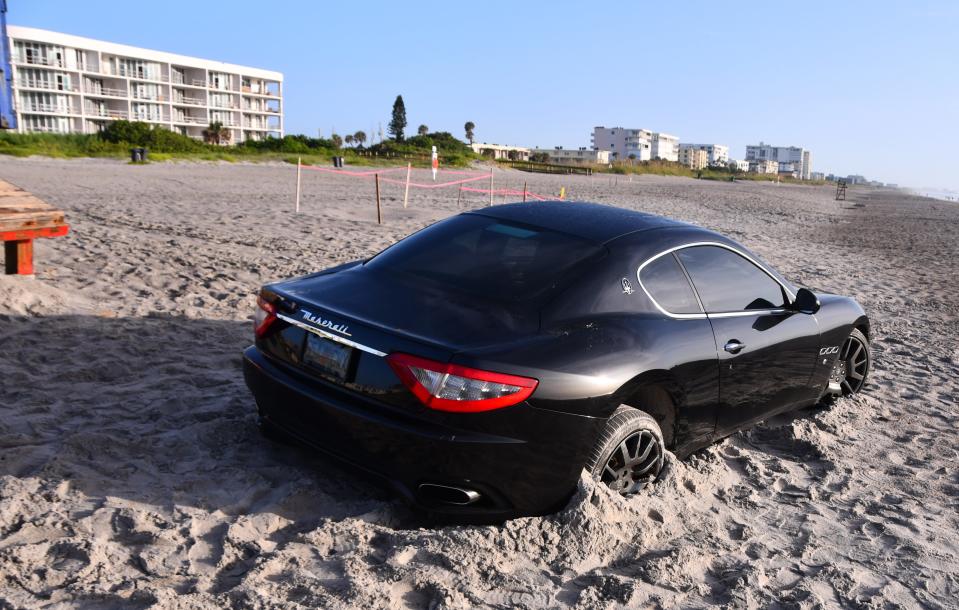 “My Maserati does 185…. “ but early Wednesday, the Italian sports car was stuck in the sand at the end of Minutemen Causeway just east of the lifeguard stand in Cocoa Beach.