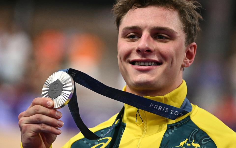 Silver medallist Australia's Matthew Richardson poses on the podium of the men's track cycling sprint event of the Paris 2024 Olympic Games at the Saint-Quentin-en-Yvelines National Velodrome in Montigny-le-Bretonneux, south-west of Paris, on August 9, 2024