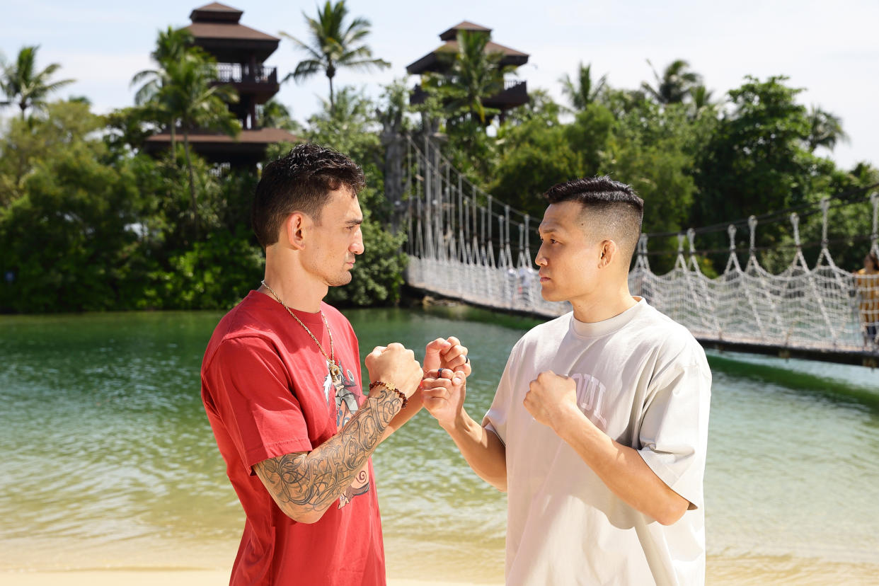 SINGAPORE, SINGAPORE - AUGUST 22: (L-R) Opponents Max Holloway and 'The Korean Zombie' Chan Sung Jung of South Korea face off ahead of their fight at Sentosa Resort on August 22, 2023 in Singapore. (Photo by Suhaimi Abdullah/Zuffa LLC via Getty Images)