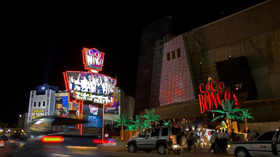 Boulevard Kukulcan signs illuminated Coco Bongo nightclub Cancun Quintana Roo Mexico