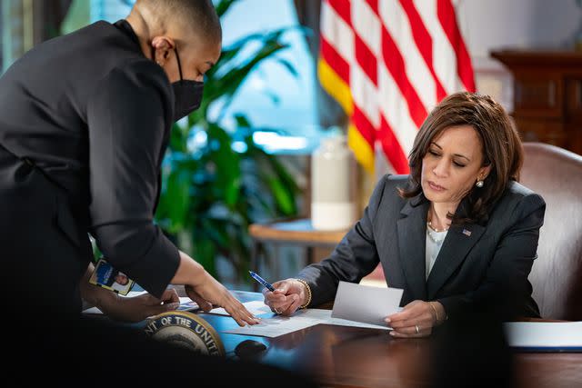 <p>Official White House Photo by Carlos Fyfe</p> Symone Sanders-Townsend meets with Vice President Kamala Harris on May 12, 2021