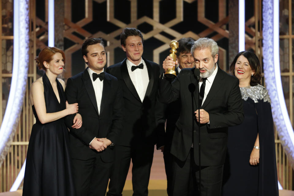 This image released by NBC shows filmmaker Sam Mendes accepting the award for best motion picture drama for "1917" at the 77th Annual Golden Globe Awards at the Beverly Hilton Hotel in Beverly Hills, Calif., on Sunday, Jan. 5, 2020. (Paul Drinkwater/NBC via AP)