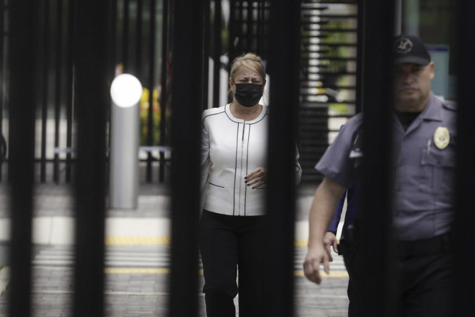 Puerto Rico's former Gov. Wanda Vazquez leaves a court after she was released on bail, in San Juan, Puerto Rico, Thursday, Aug. 4, 2022. Vazquez, who was arrested Thursday, is accused of engaging in a bribery scheme from December 2019 through June 2020, while she was governor, with several people, including a Venezuelan-Italian bank owner, a former FBI agent, a bank president and a political consultant. (AP Photo/Alejandro Granadillo)