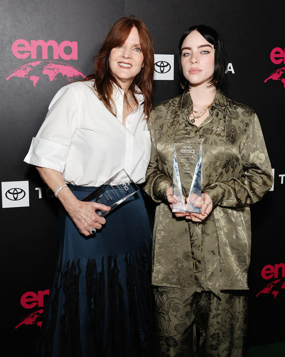 (L-R) Maggie Baird and Billie Eilish pose with award during the 32nd Annual EMA Awards Gala honoring Billie Eilish, Maggie Baird And Nikki Reed presented by Toyota on October 08, 2022 in Los Angeles, California.