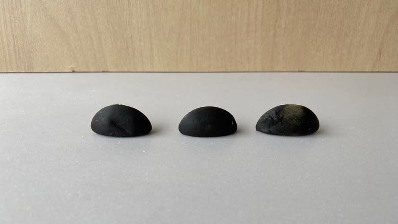 three liquorice candies