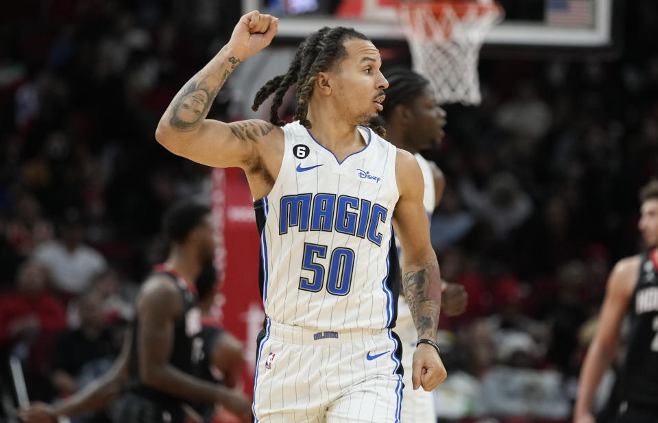 Orlando Magic guard Cole Anthony (50) reacts after making a three point basket during the second half of an NBA basketball game against the Houston Rockets, Wednesday, Dec. 21, 2022, in Houston. (AP Photo/Eric Christian Smith)