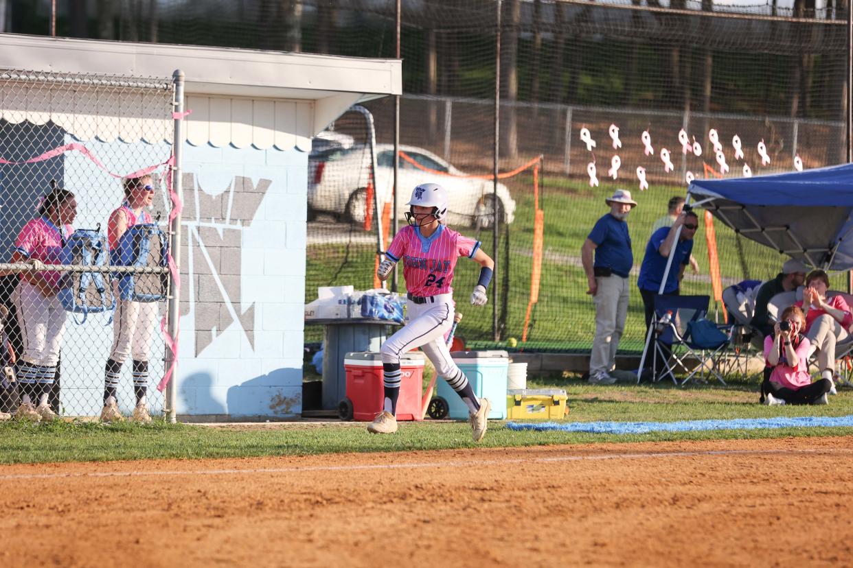 John Jay's Lyla Dwyer heads for home against Carmel during John Jay's "Pink Out" softball game on May 1, 2024. The event raised funds for Miles of Hope Breast Cancer Foundation.