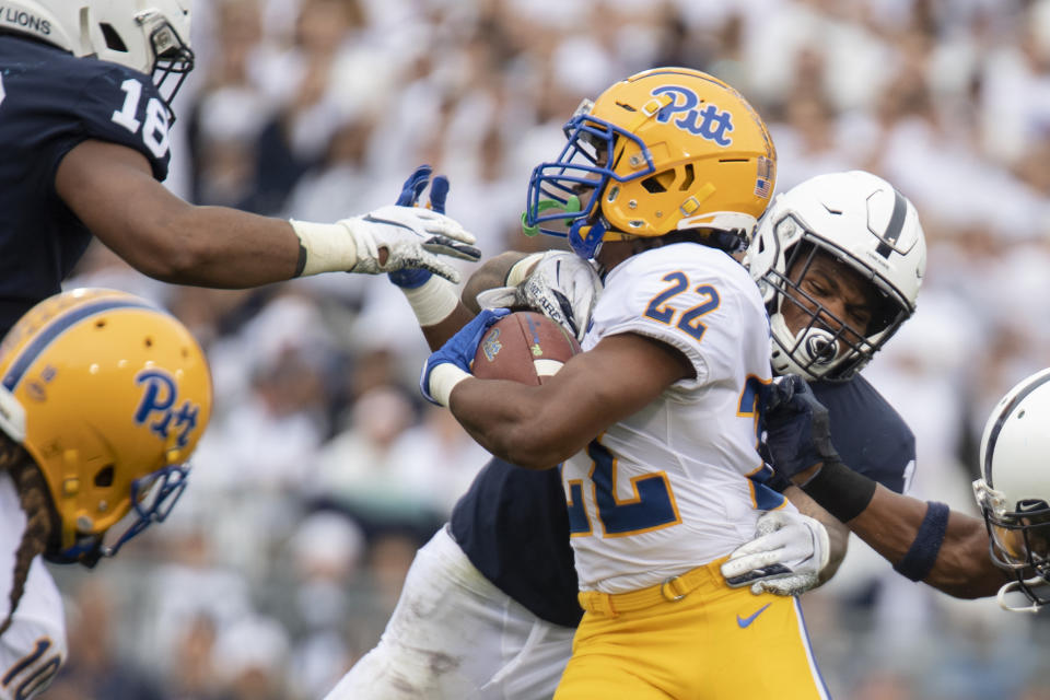 Penn State linebacker Micah Parsons (11) tackles Pittsburgh running back Vincent Davis (22) in the second quarter of an NCAA college football game in State College, Pa., on Saturday, Sept. 14, 2019. (AP Photo/Barry Reeger)