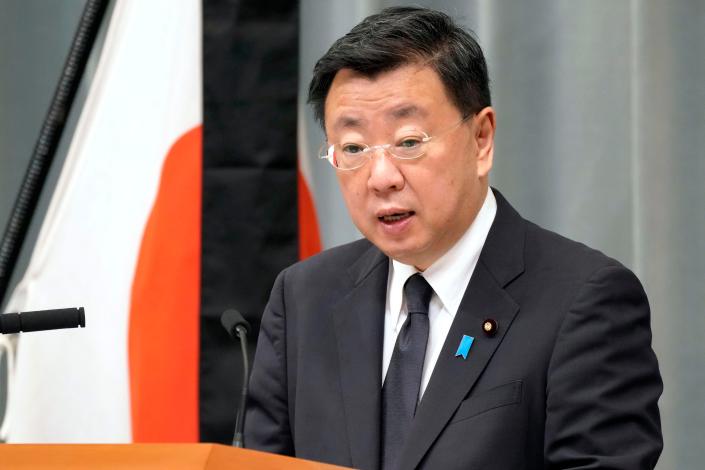 Japan’s chief cabinet secretary Hirokazu Matsuno speaks at a press conference in Tokyo Tuesday, 27 September 2022 (AP)