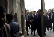 Iranian Foreign Minister Mohammad Javad Zarif (C) arrives at the Beau Rivage Palace Hotel during an extended round of talks on Iran's nuclear programme on April 2, 2015 in Lausanne. REUTERS/Brendan Smialowski/Pool