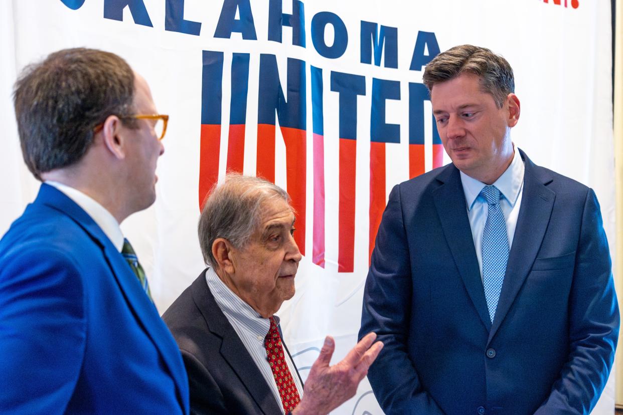 Tulsa Mayor G.T. Bynum, left, speaks with former U.S. Rep. Mickey Edwards, center, and Oklahoma City Mayor David Holt, right, at a fundraiser for Oklahomans United for Progress, a group seeking to establish an open GOP primary in Oklahoma.