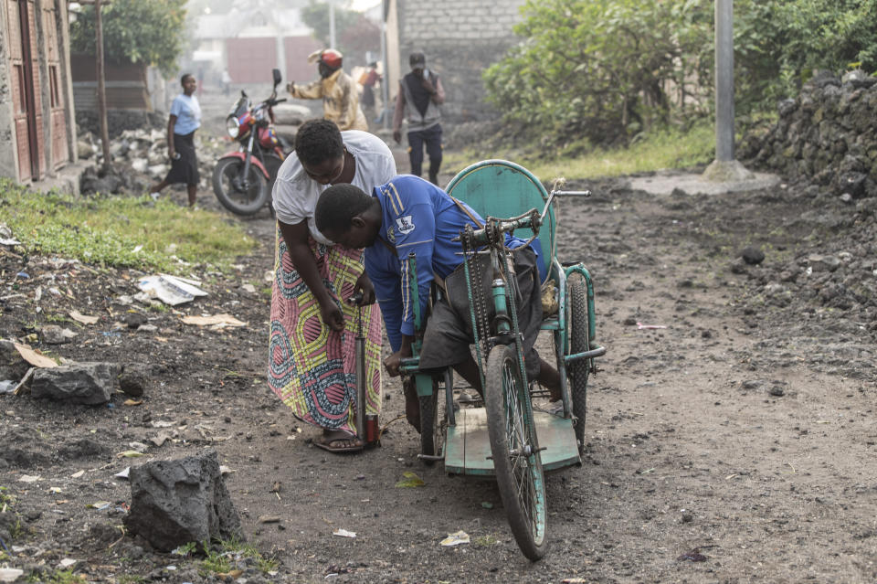 Paul Mitemberezi, a market vendor who has been disabled since he was 3 because of polio, leave his house for work, in Goma, democratic Republic of Congo, Tuesday Jan. 17, 2023. When Pope Francis arrives in Congo and South Sudan Jan. 31, thousands of people will take special note of a gesture more grounded than the sign of the cross. Watching from their wheelchairs, they will relate to the way he uses his. (AP Photo/Moses Sawasawa)