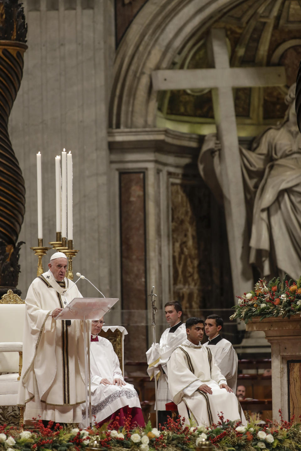 Pope Francis celebrates Christmas Eve Mass in St. Peter's Basilica at the Vatican, Tuesday, Dec. 24, 2019. (AP Photo/Alessandra Tarantino)