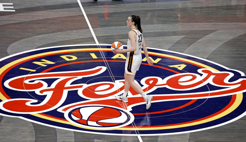 INDIANAPOLIS, IN - JUNE 19: Indiana Fever guard Caitlin Clark (22) brings the ball up court against the Washington Mystics on June 19, 2024, at Gainbridge Fieldhouse in Indianapolis, Indiana. (Photo by Brian Spurlock/Icon Sportswire via Getty Images)