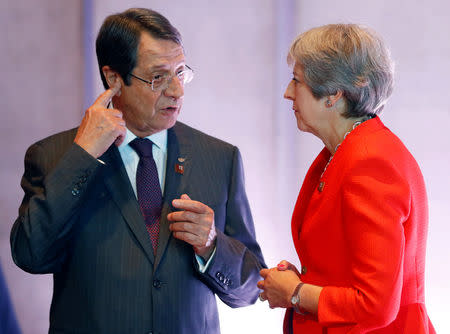 Britain's Prime Minister Theresa May and President of Cyprus Nicos Anastasiades talk during the European Union leaders informal summit in Salzburg, Austria, September 20, 2018. REUTERS/Leonhard Foeger
