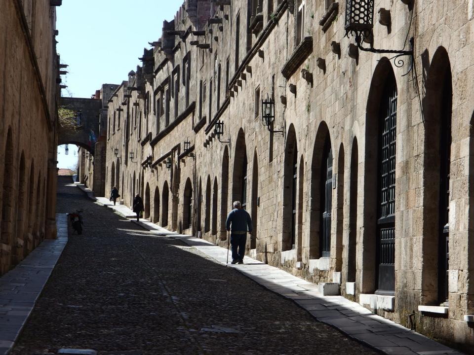 Empty quarter: A street in Rhodes Town, destination for one of the first holiday flights from the UK this summer: Simon Calder