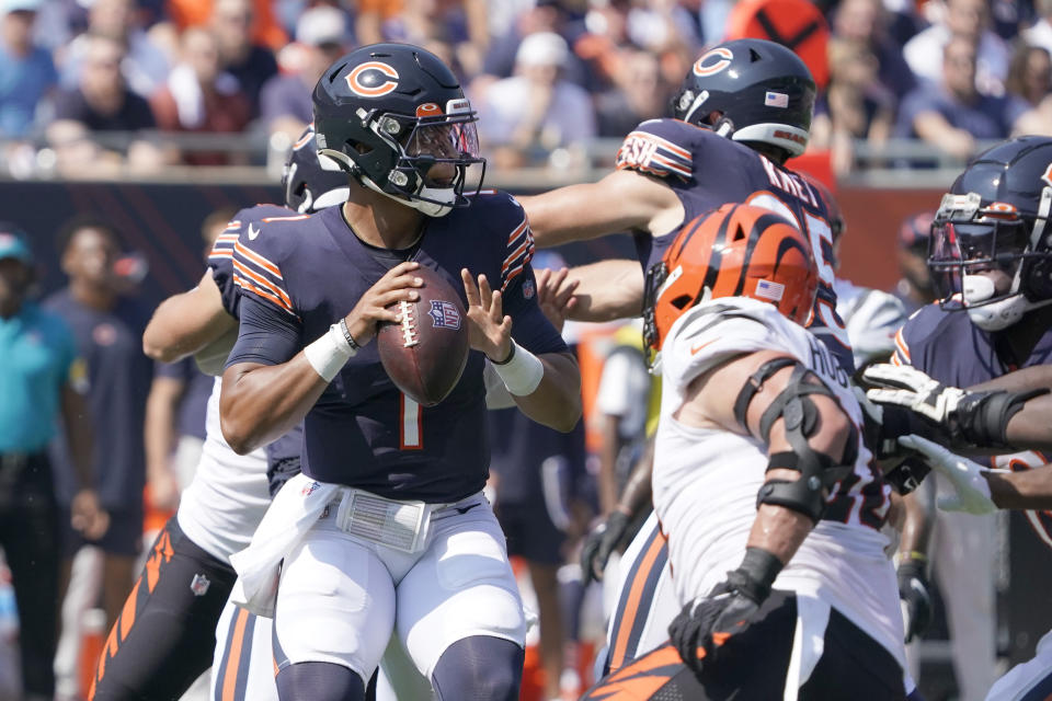 Chicago Bears quarterback Justin Fields looks to pass during the first half of an NFL football game against the Cincinnati Bengals Sunday, Sept. 19, 2021, in Chicago. (AP Photo/David Banks)