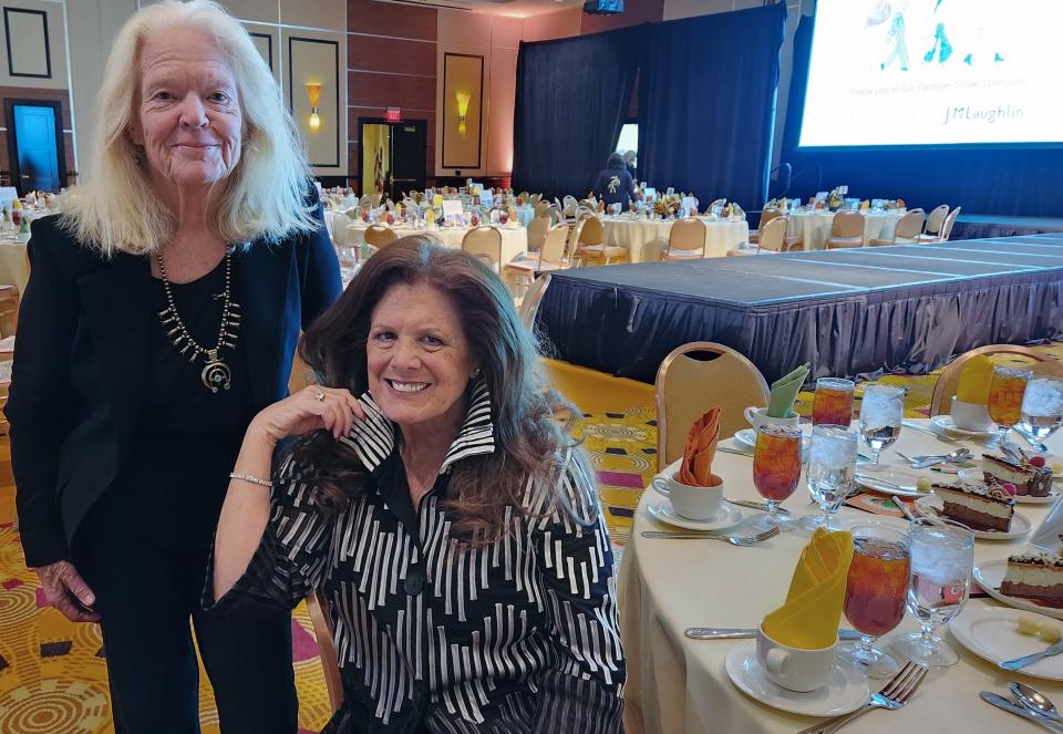 Hidden Harvest founder Christy Porter stands next to Friends of Hidden Harvest President Dee Brown at the organization's annual harvest luncheon and fashion show, Nov. 17, 2022.