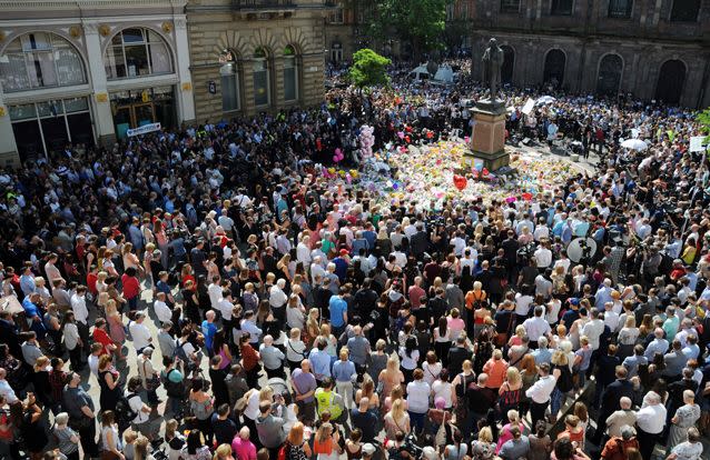 The mourners in the centre of Manchester were overcome by song. Source: AP
