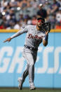 Detroit Tigers right fielder Victor Reyes makes a running catch for the out on Cleveland Guardians' Amed Rosario during the third inning in the first baseball game of a doubleheader, Monday, Aug. 15, 2022, in Cleveland. (AP Photo/Ron Schwane)