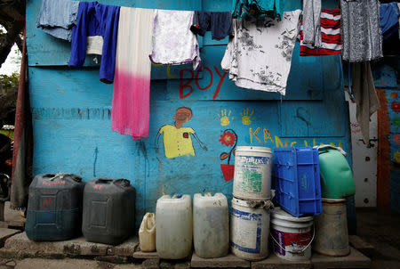 Water containers are pictured outside a house in New Delhi, India, June 26, 2018. Picture taken June 26, 2018. REUTERS/Adnan Abidi