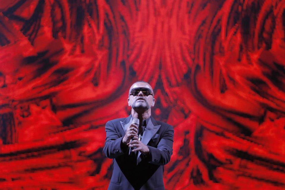 British singer George Michael performs at a concert to raise money for AIDS charity Sidaction, during the Symphonica tour at Palais Garnier Opera house in Paris, France, Sunday, Sept. 9, 2012. (AP Photo/Francois Mori)