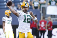 Green Bay Packers quarterback Aaron Rodgers warms up for the team's NFL preseason football game against the Oakland Raiders on Thursday, Aug. 22, 2019, in Winnipeg, Manitoba. (John Woods/The Canadian Press via AP)