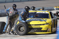 Dale Earnhardt Jr. makes a pit stop during a NASCAR Xfinity Series auto race Saturday, June 13, 2020, in Homestead, Fla. (AP Photo/Wilfredo Lee)