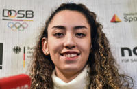 Iranian Taekwondo athlete Kimia Alizadeh speaks to the media at a press conference in Luenen, Germany, Friday, Jan. 24, 2020. Iran's only female Olympic medalist fled from the Islamic Republic and said she wants to compete for Germany. (AP Photo/Martin Meissner)