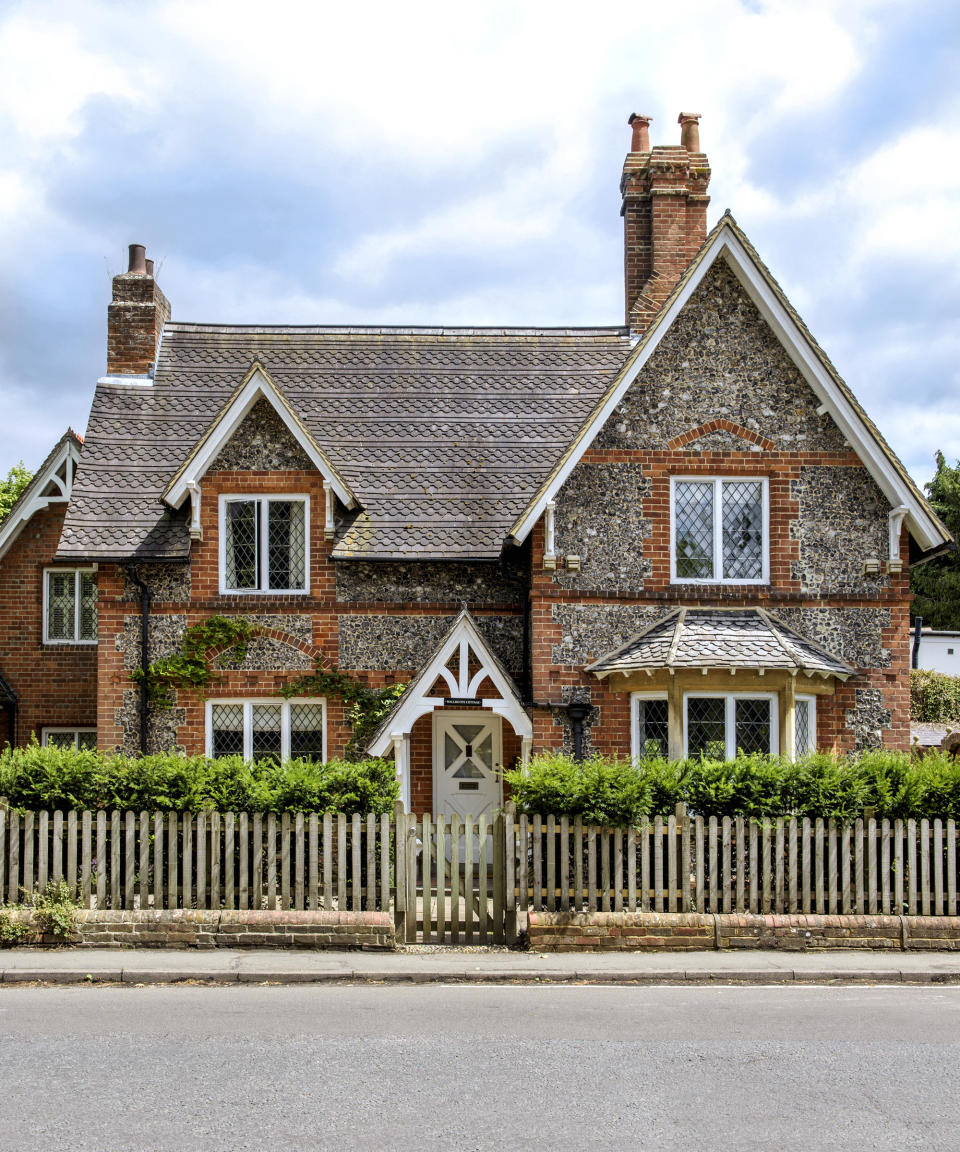 Soften fences with hedges and climbers