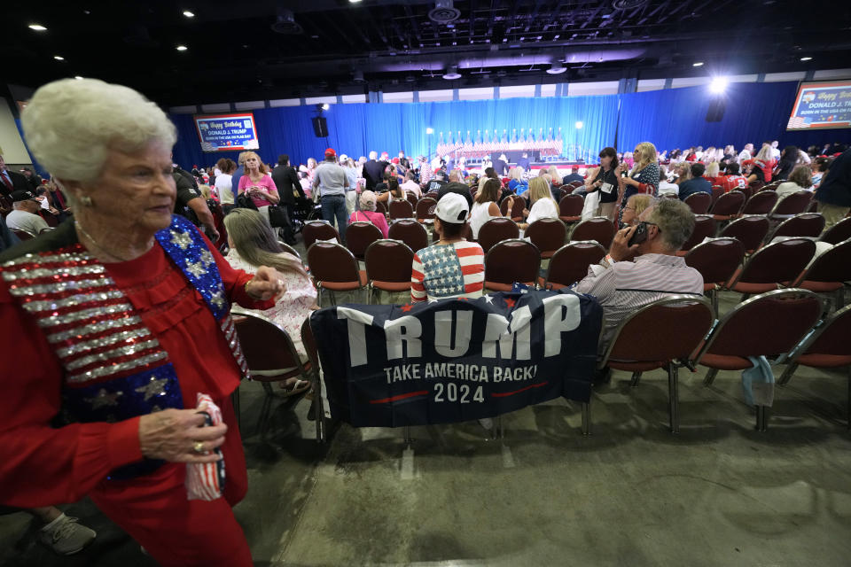 Supporters arrive before Republican presidential candidate former President Donald Trump speaks at his birthday celebration, hosted by Club 47, in West Palm Beach, Fla., Friday, June 14, 2024. (AP Photo/Gerald Herbert)