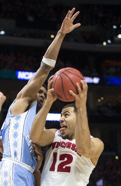 Wisconsin guard Traevon Jackson drives the lane against North Carolina’s Joel Berry II during a 2015 NCAA Tournament game in Los Angeles March 26.