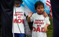 <p>Boys wearing shirts calling for their parents not to be deported stand during a rally by immigration activists CASA and United We Dream demanding the Trump administration protect the Deferred Action for Childhood Arrivals (DACA) program and the Temporary Protection Status (TPS) programs, in Washington, D.C., Aug. 15, 2017. (Photo: Joshua Roberts/Reuters) </p>