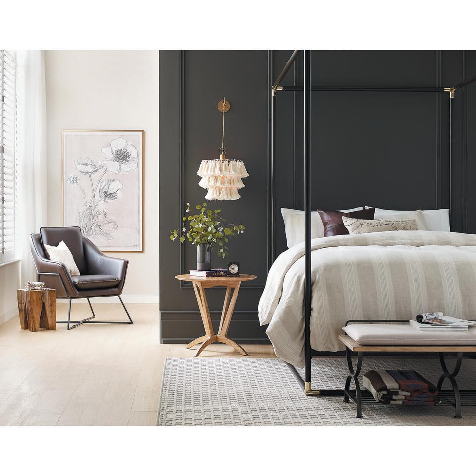 <p>"Rooted in nature, Sherwin Williams' 2021 Color of the Year <a href="https://www.sherwin-williams.com/architects-specifiers-designers/color/find-and-explore-colors/paint-colors-by-family/SW7048-urbane-bronze" rel="nofollow noopener" target="_blank" data-ylk="slk:Urbane Bronze SW 7048;elm:context_link;itc:0;sec:content-canvas" class="link ">Urbane Bronze SW 7048</a> creates a sense of calm by conveying safety and security. I recommend painting it on all four walls for a cozy, cocoon feeling." — <a href="https://www.sherwin-williams.com/" rel="nofollow noopener" target="_blank" data-ylk="slk:Sherwin Williams;elm:context_link;itc:0;sec:content-canvas" class="link ">Sherwin Williams</a>' Sue Wadden</p>