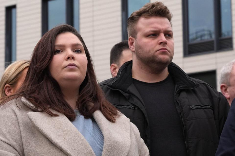 Ellie and Harry Baxter, the son and daughter of Stephen, 61, and Carol, 64, Baxter, outside Chelmsford Crown Court after D’Wit was jailed for life (Stefan Rousseau/PA Wire)