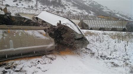 The aftermath of a freight train collision in northern Utah January 8, 2014 is pictured in this Utah Highway Patrol handout photo. REUTERS/Lt. Chris Simmons/Utah Highway Patrol/Handout