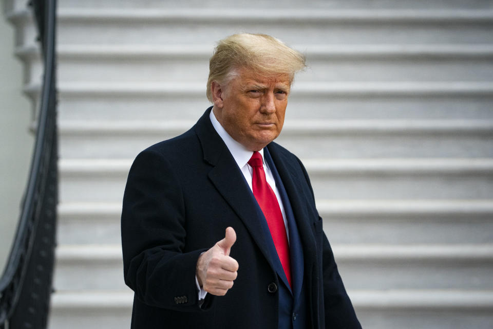 U.S. President Donald Trump gives a thumbs up as he departs on the South Lawn of the White House, on December 12, 2020 in Washington, DC. (Al Drago/Getty Images)