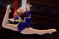 <b>Anastasia Grishina</b><br>16 ans<br>Russie<br>Gymnastique