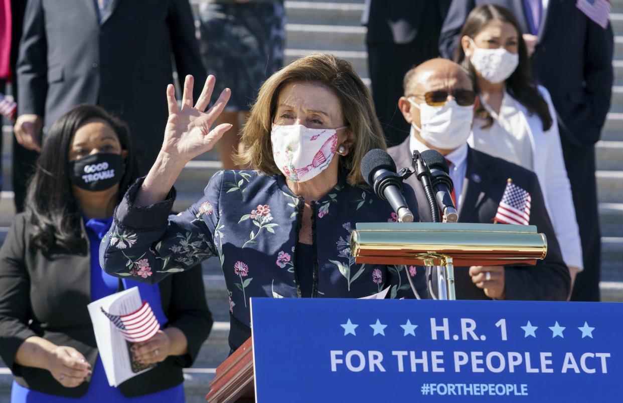 <span class="caption">Speaker of the House Nancy Pelosi, D-Calif., and fellow Democrats address reporters on H.R. 1 at the Capitol in Washington on March 3, 2021. </span> <span class="attribution"><a class="link " href="https://newsroom.ap.org/detail/CongressElectionsBill/bbb98c18fc4047448da85c56d8450148/photo?Query=H.R.%201%20House&mediaType=photo&sortBy=arrivaldatetime:desc&dateRange=Anytime&totalCount=49&currentItemNo=9" rel="nofollow noopener" target="_blank" data-ylk="slk:J. Scott Applewhite/AP Photos;elm:context_link;itc:0;sec:content-canvas">J. Scott Applewhite/AP Photos</a></span>