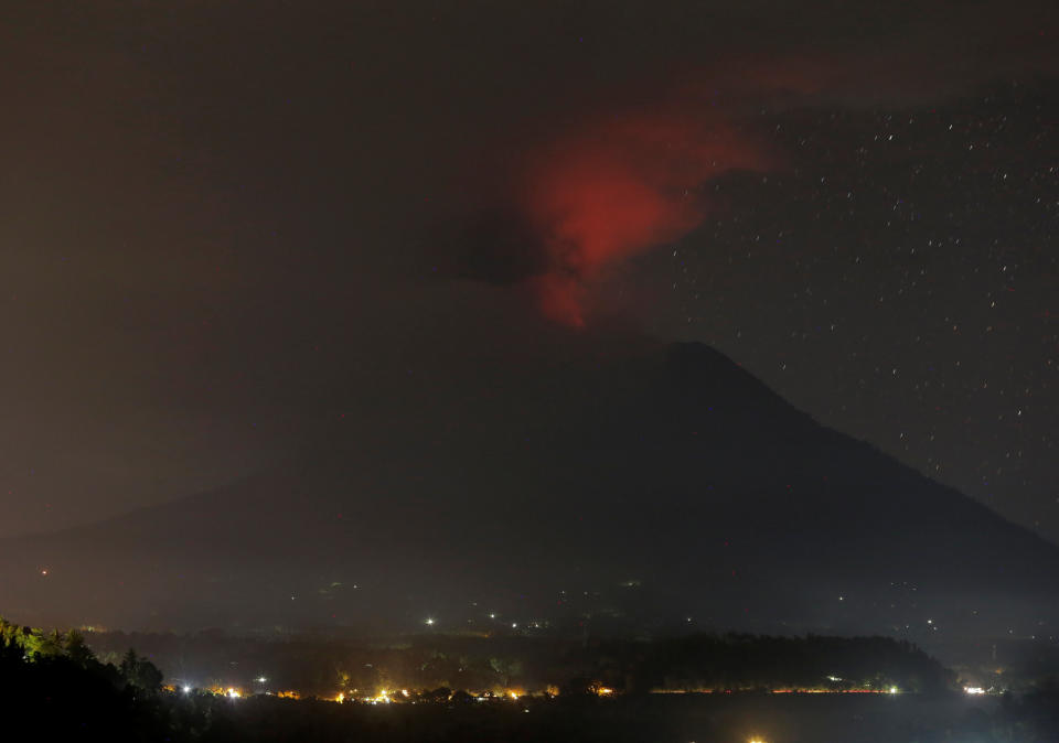 <p>Mount Agung volcano erupts as seen from Glumpang village, Karangasem, Bali, Indonesia on Nov. 26, 2017. (Photo: Johannes P. Christo/Reuters) </p>