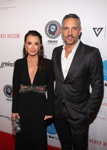 <p>Jesse Grant/Getty Images</p> (L-R) Kyle Richards and Mauricio Umansky are pictured attending the Homeless Not Toothless Hollywood Gala at The Beverly Hilton on April 22, 2023 in Beverly Hills, California.