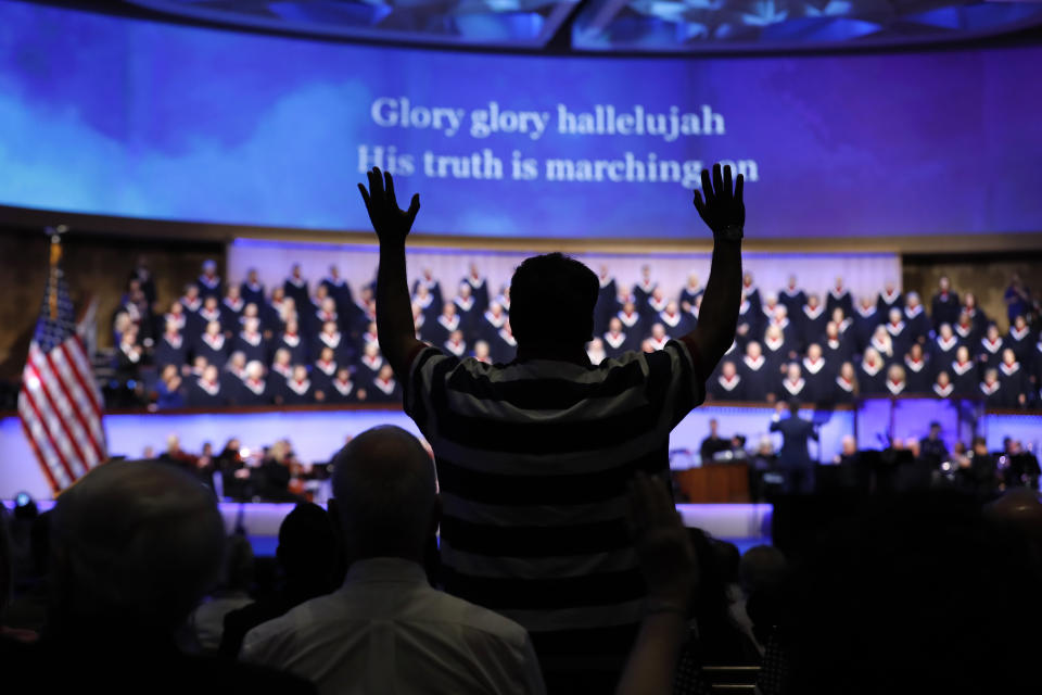 An attendee stands at First Baptist Church Dallas on June 28, 2020.  (Photo: AP Photo/Tony Gutierrez)