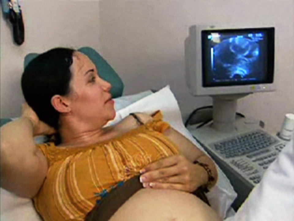 **FILE**This file image orignally made from a 2006 video provided by KTLA shows Nadya Suleman looking at a ultrasound of her unborn twins at an in-vitro fertilization clinic in Los Angeles. Suleman, who gave birth on Jan. 26, 2009 to octuplets, has gone from Miracle Mom to becoming a target for Internet scorn and ridicule.(AP Photo/KTLA)