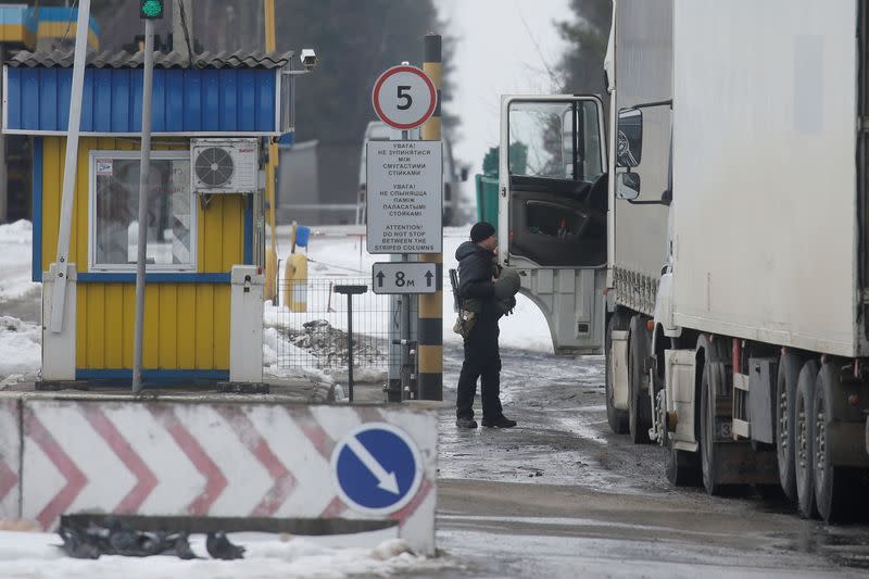 Ukrainian border guards keep watch on the border with Belarus and Russia in Chernihiv region